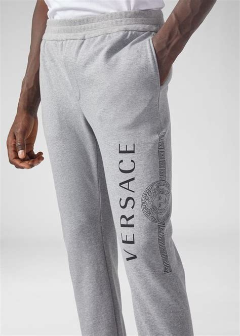 pantaloni versace uomo bianchi|Pantaloni VERSACE da Uomo .